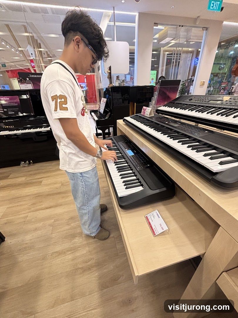 Man playing a keyboard in a store