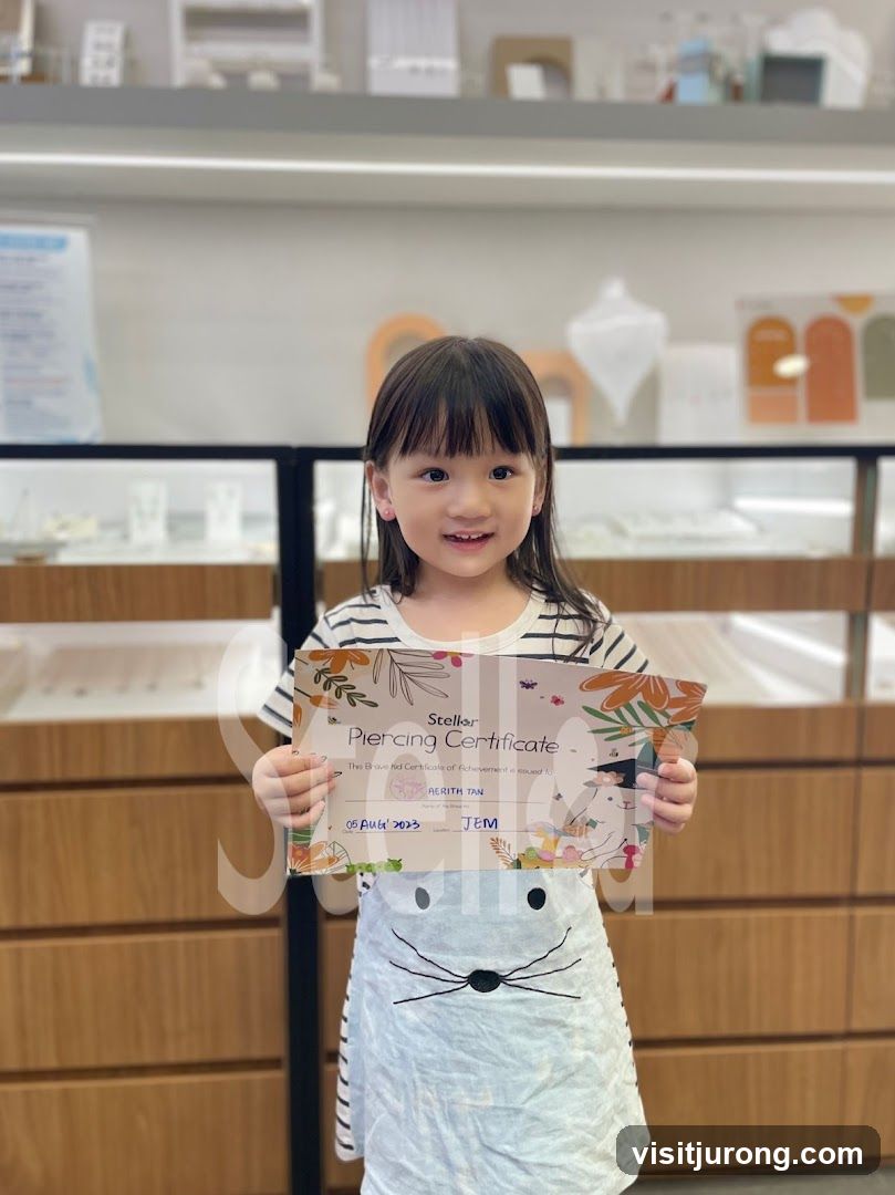 Girl Holding a Piercing Certificate