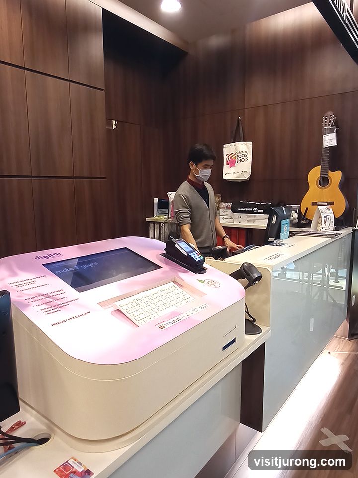 Customer service counter with interactive kiosk