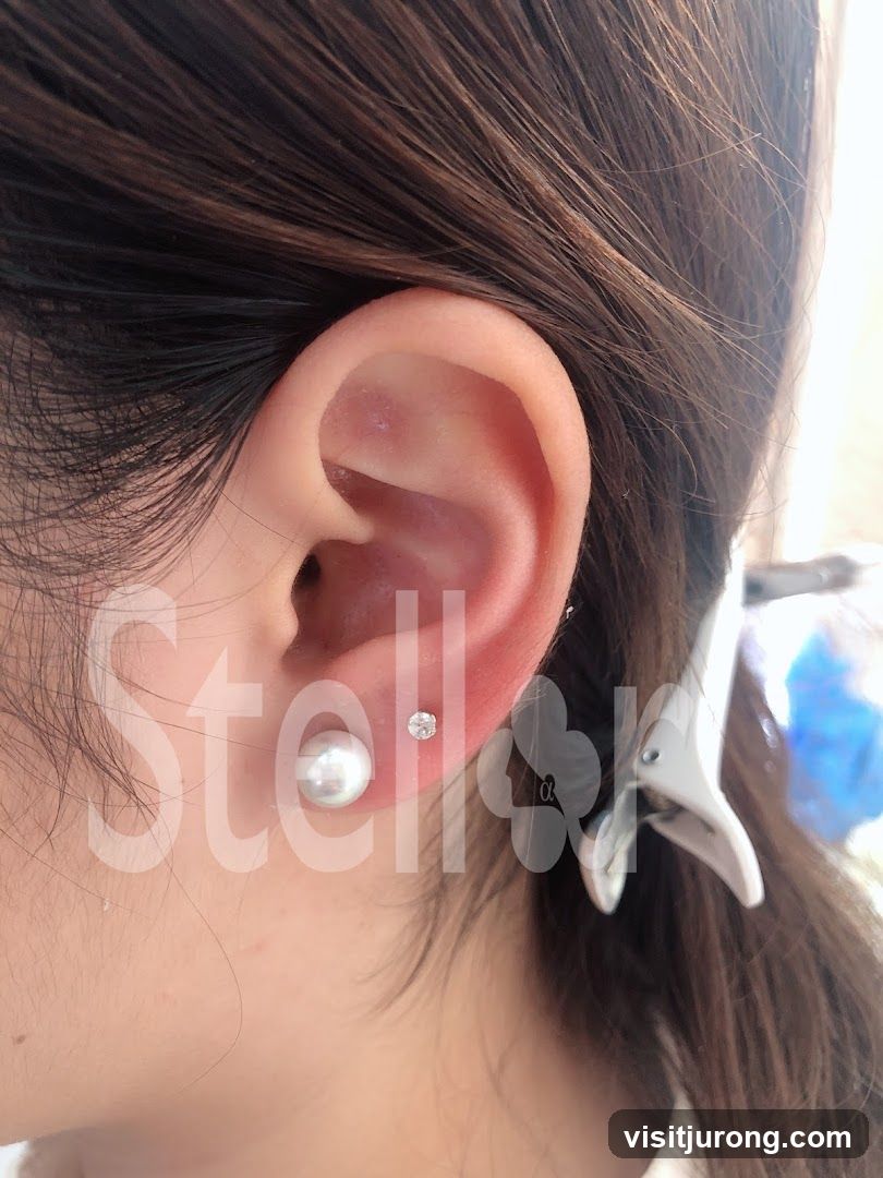 Ear Piercing with Pearl and Diamond Studs