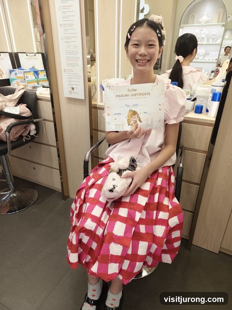 Girl Holding Piercing Certificate