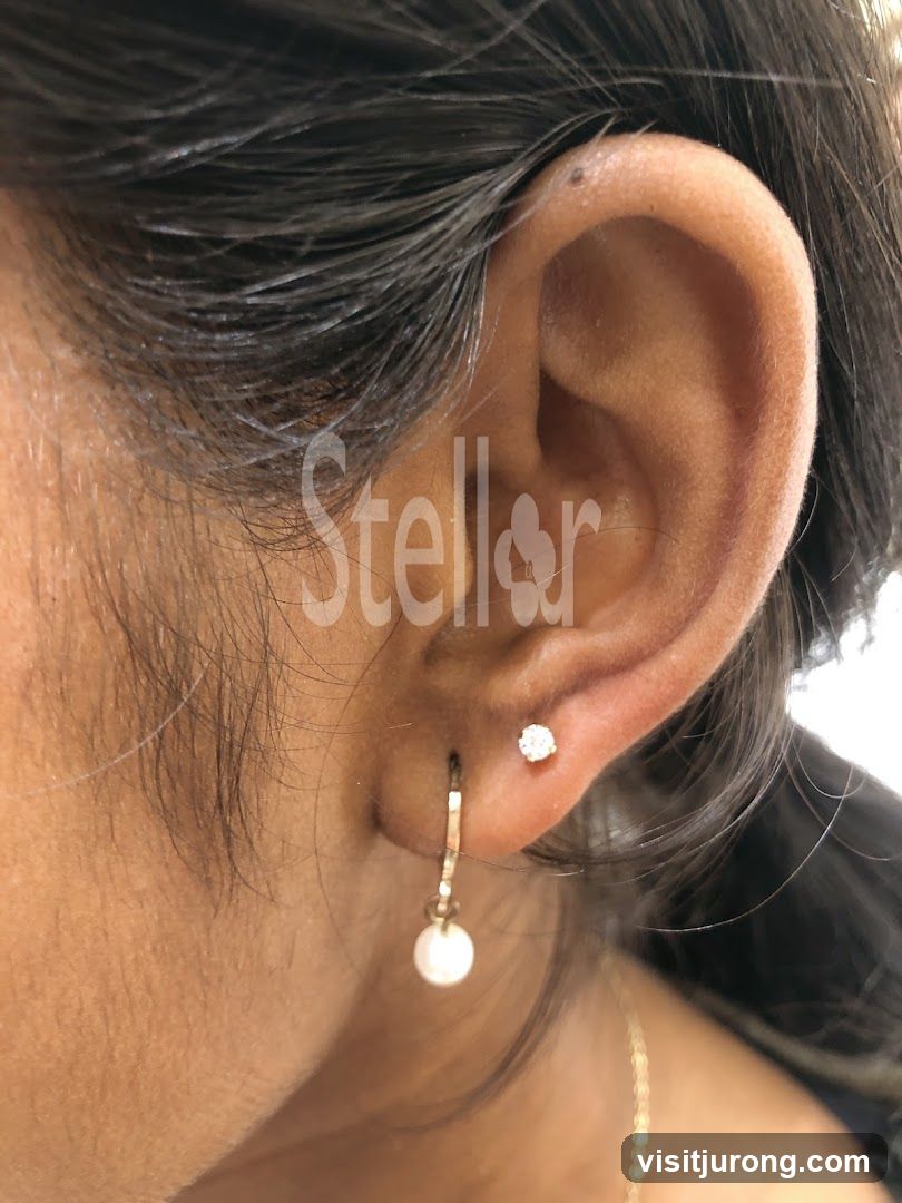 Close-up of a woman's ear with jewelry