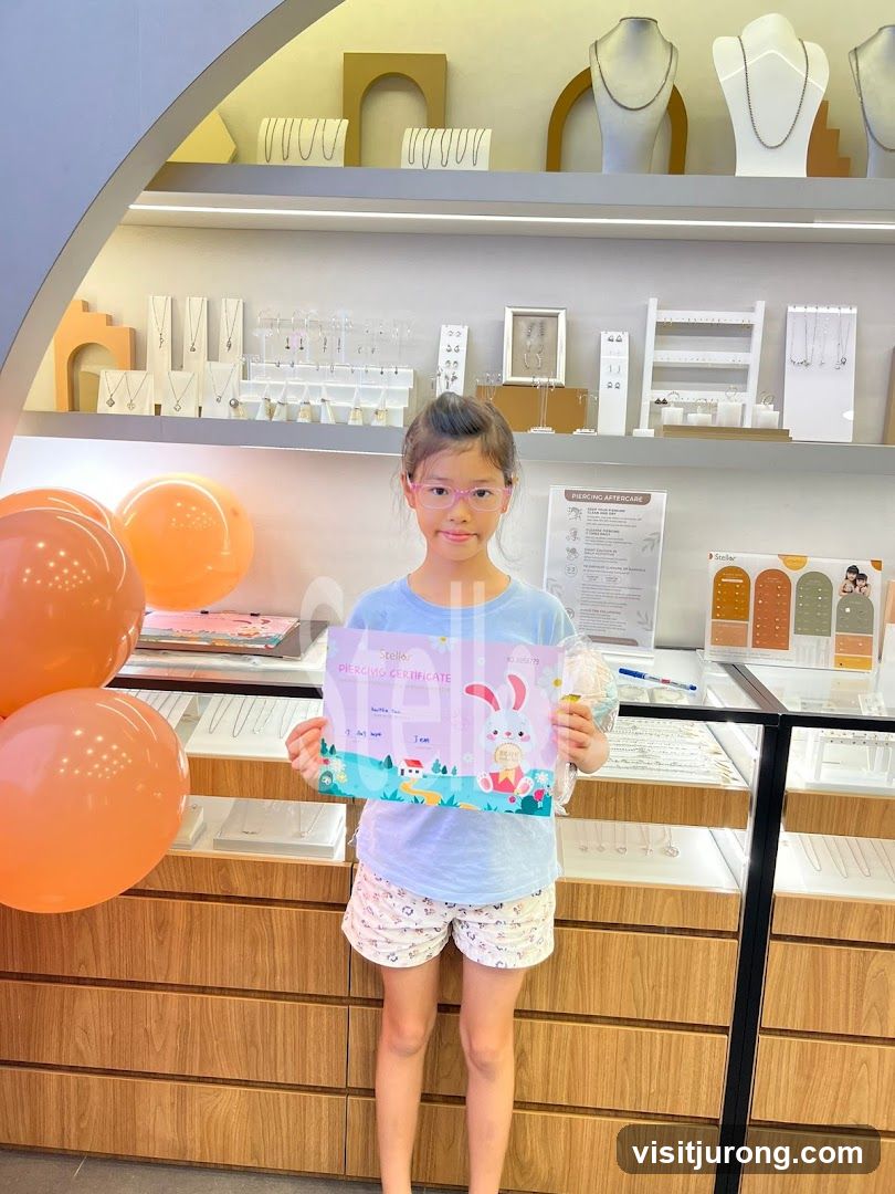 Girl holding a piercing certificate
