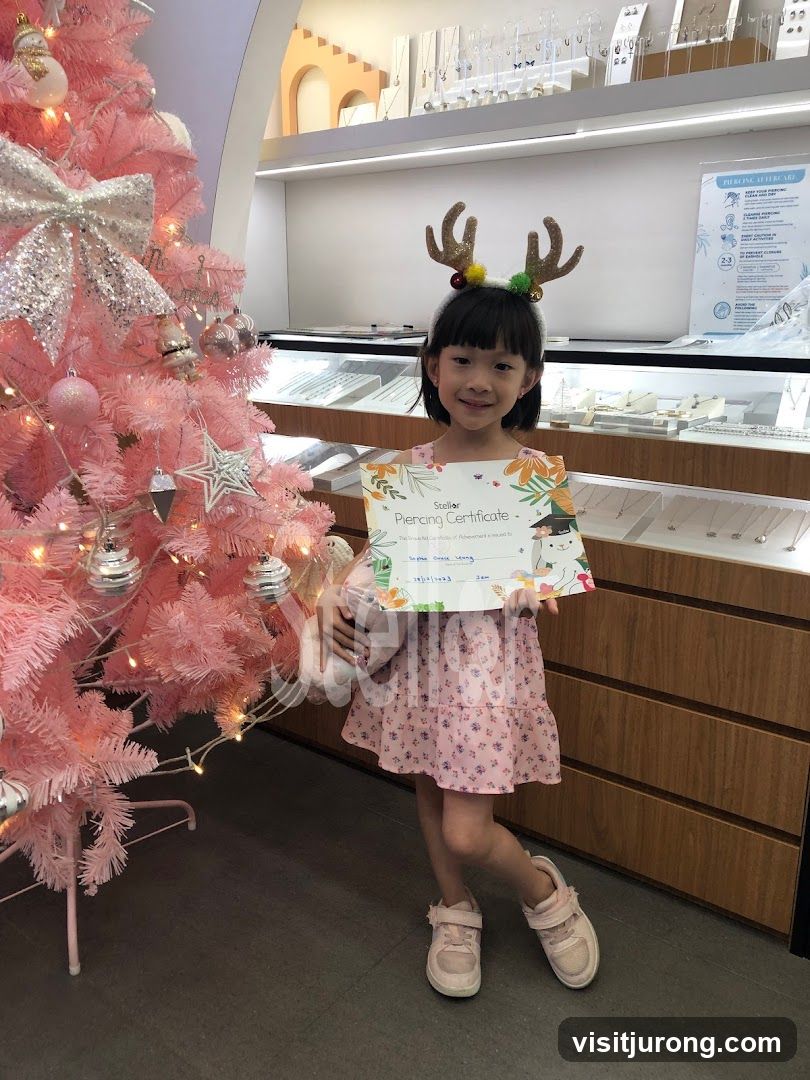 Girl Holding Piercing Certificate