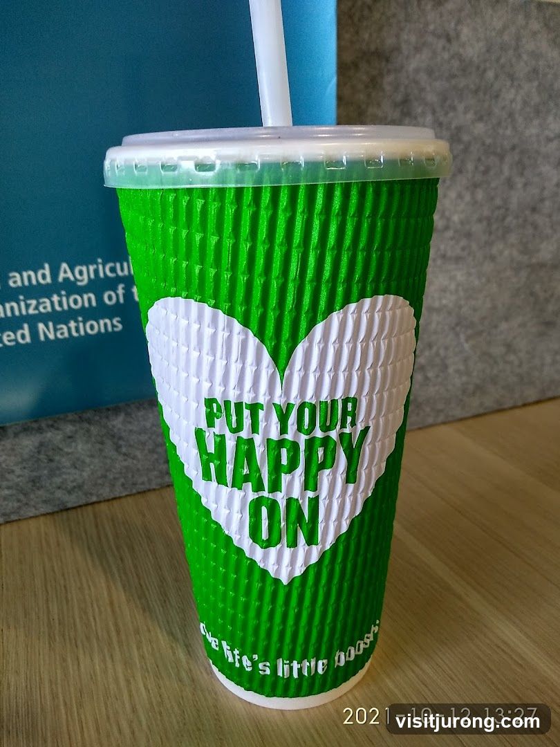 Green cup with a heart design