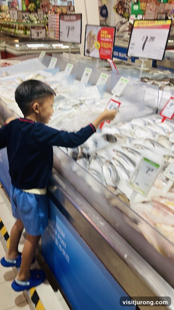 Boy at Fish Display