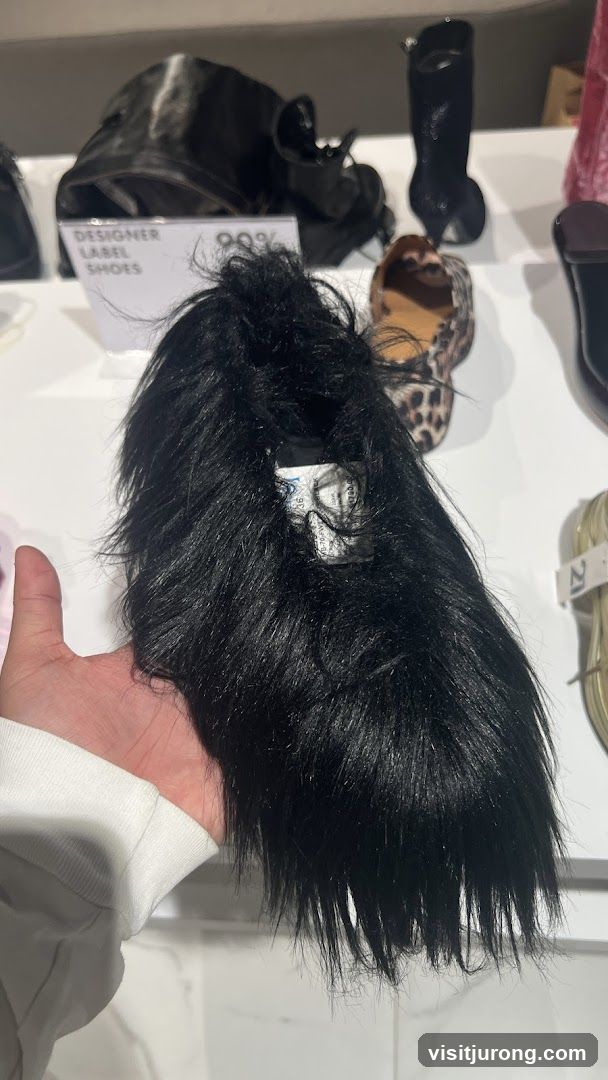 Black Furry Shoe Display