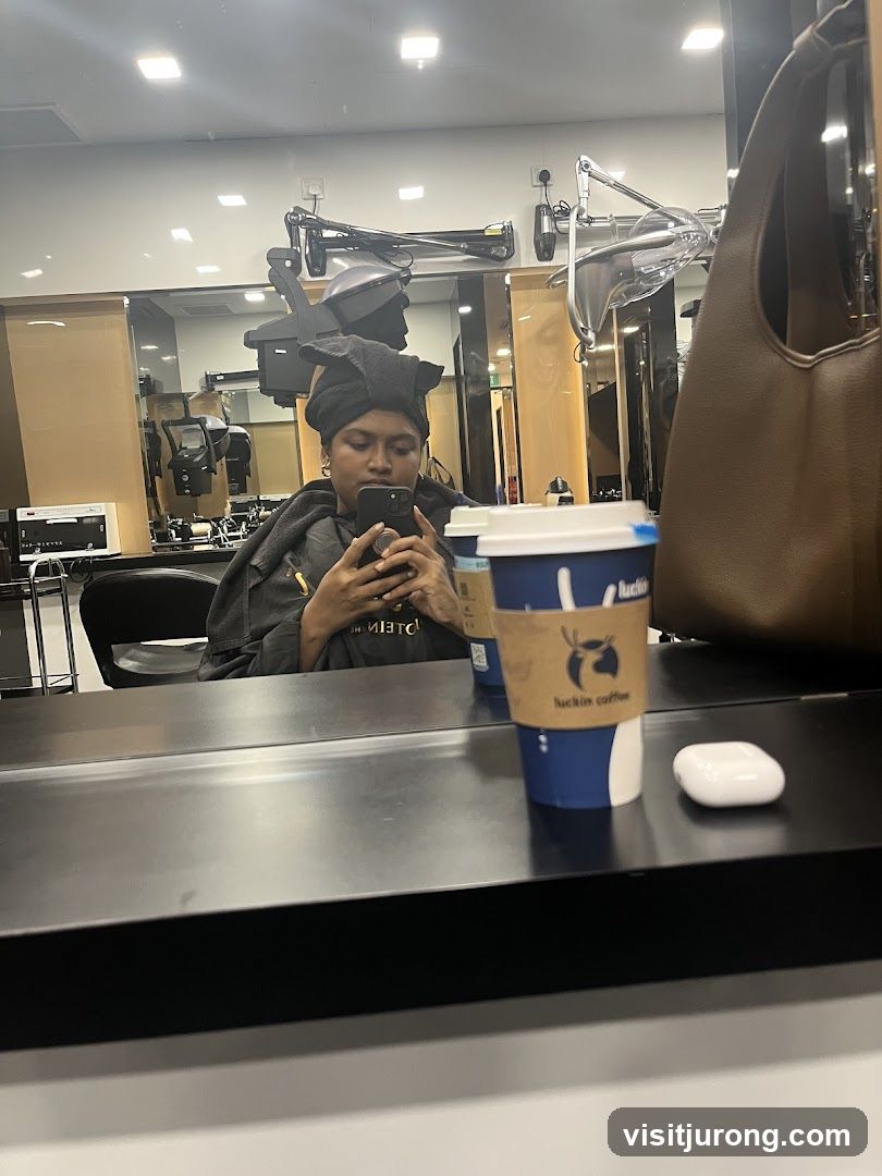 Woman taking a selfie in a salon