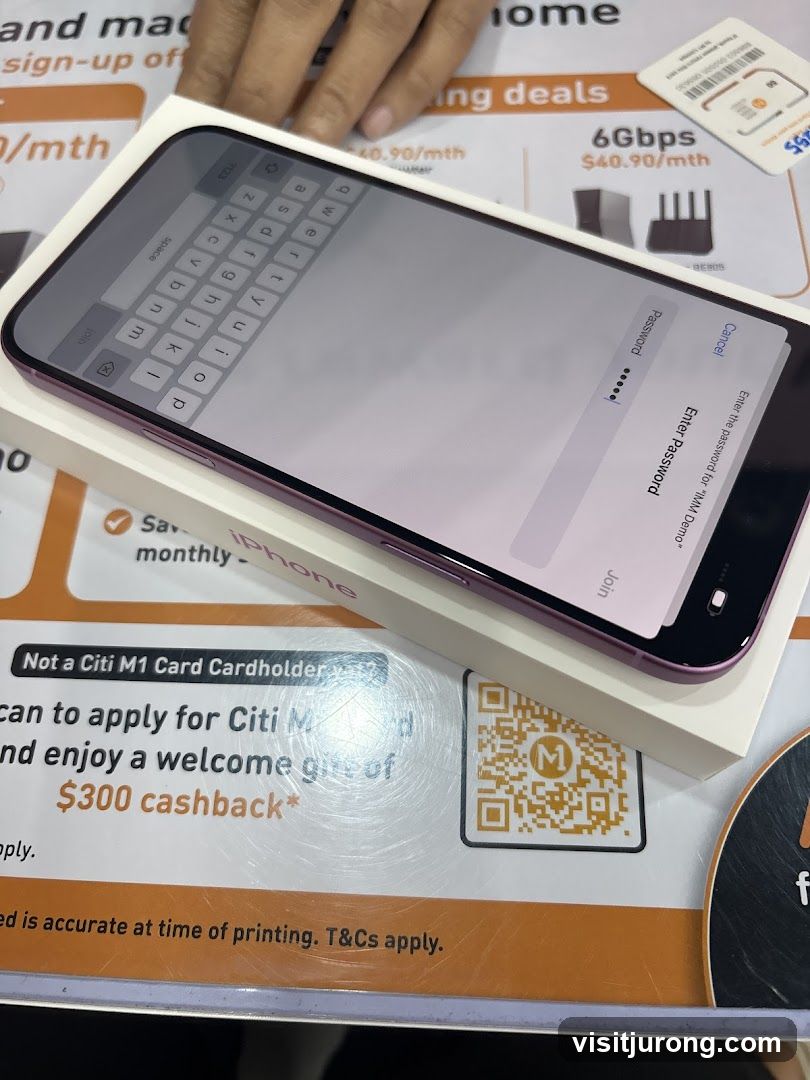 iPhone setup screen with promotional material