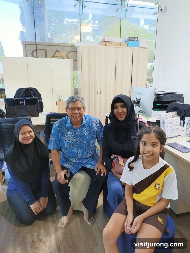 Family posing for a photo in an office
