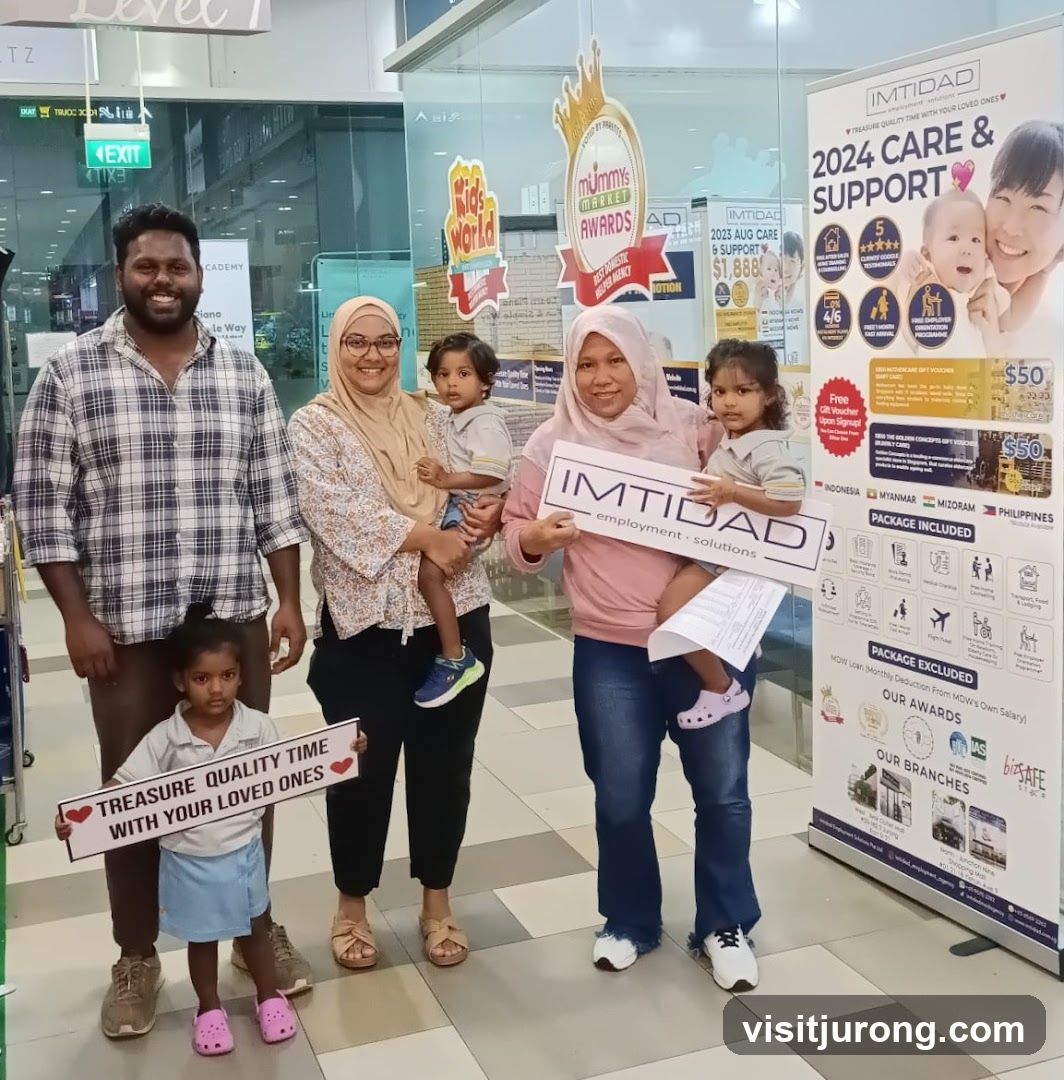 Family posing with promotional banners