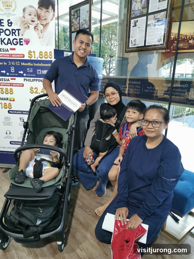 Family posing with promotional materials