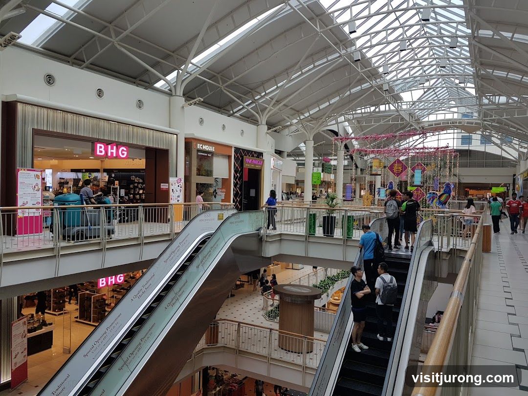 Mall Interior with Escalators and Shops