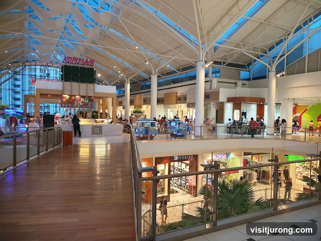 Indoor shopping mall with food court and shops