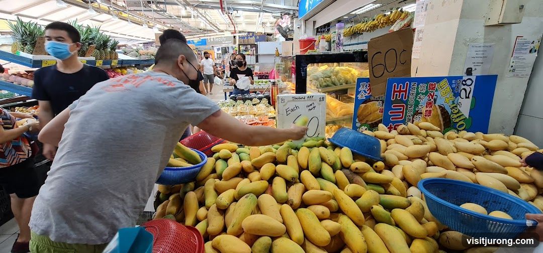 Fruit Stall with Mangoes and Durian
