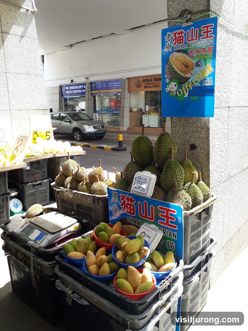 Fruit Stand with Durians and Mangoes