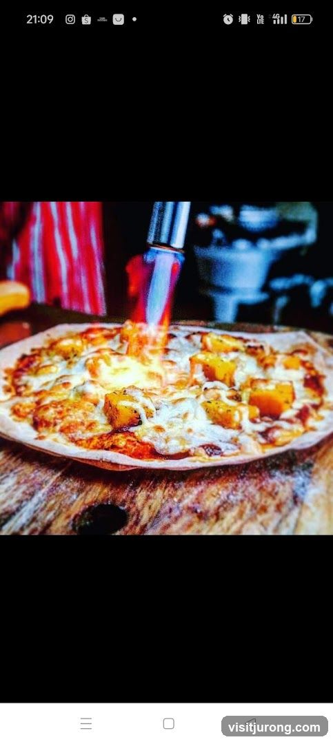 Pizza being torched