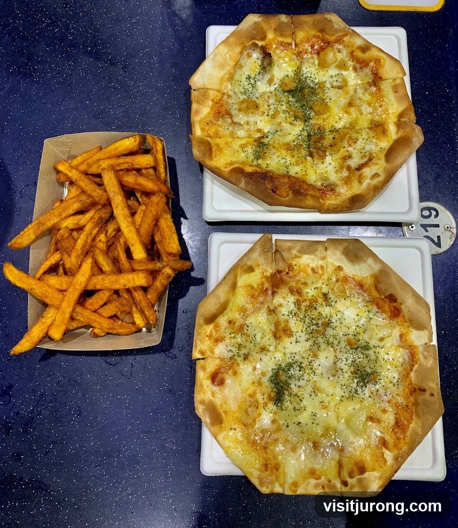 Two pizzas and fries