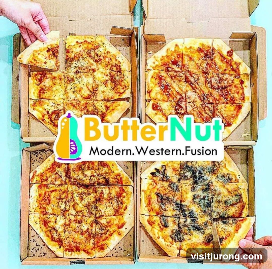Four Pizzas in Boxes