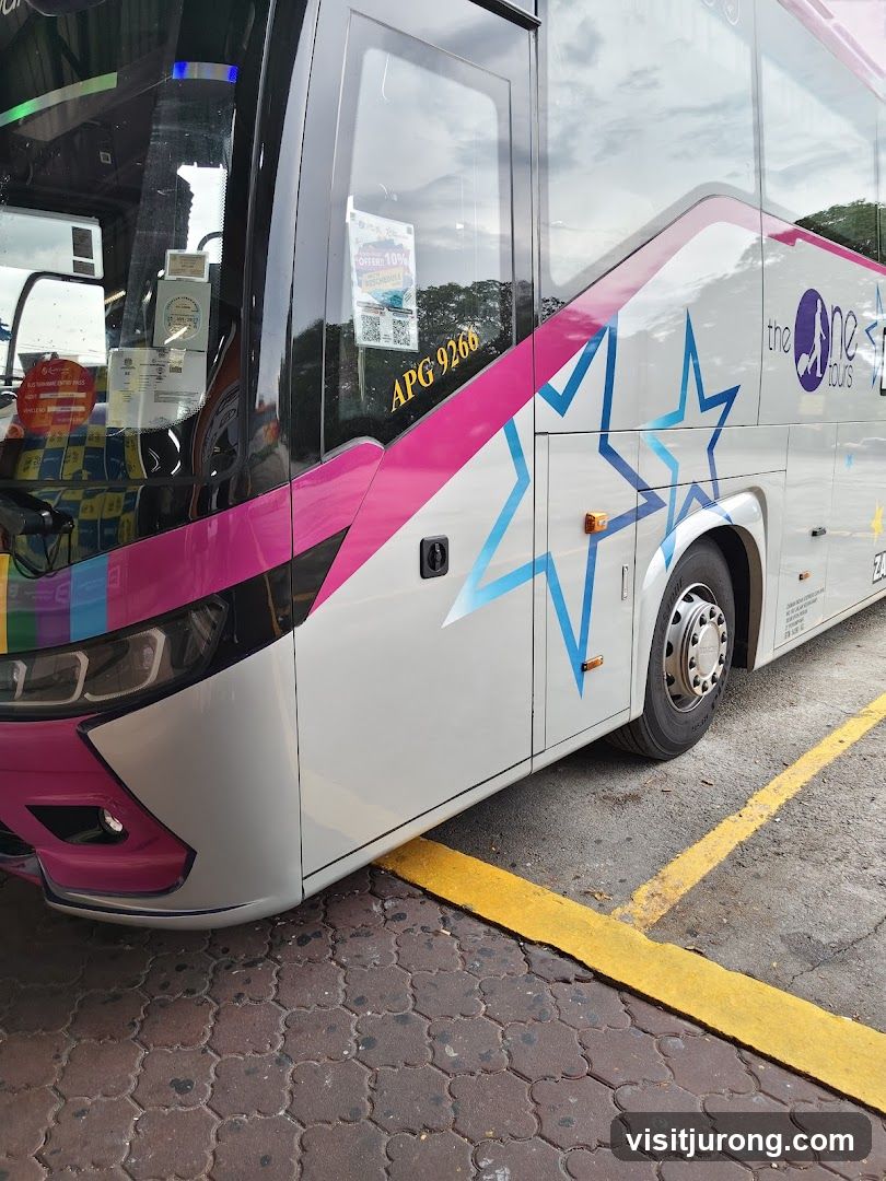 Bus with "the One Tours" branding