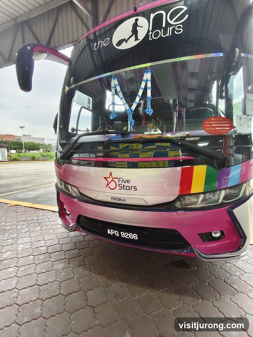 Bus with "The One Tours" and "Five Stars" branding