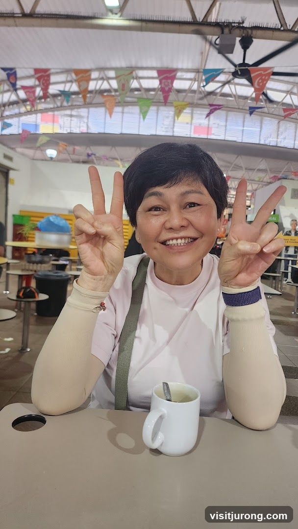 Woman making peace signs