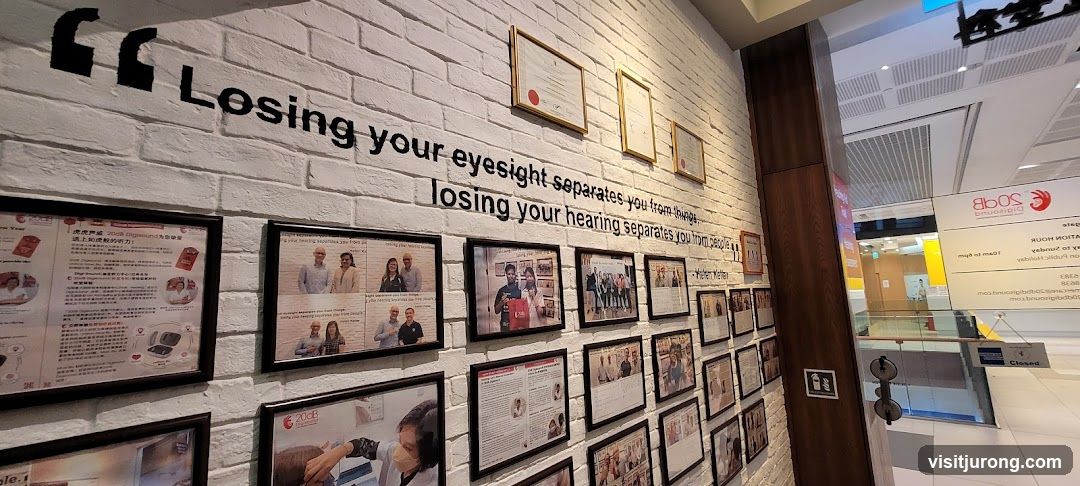 Wall with framed photos and text