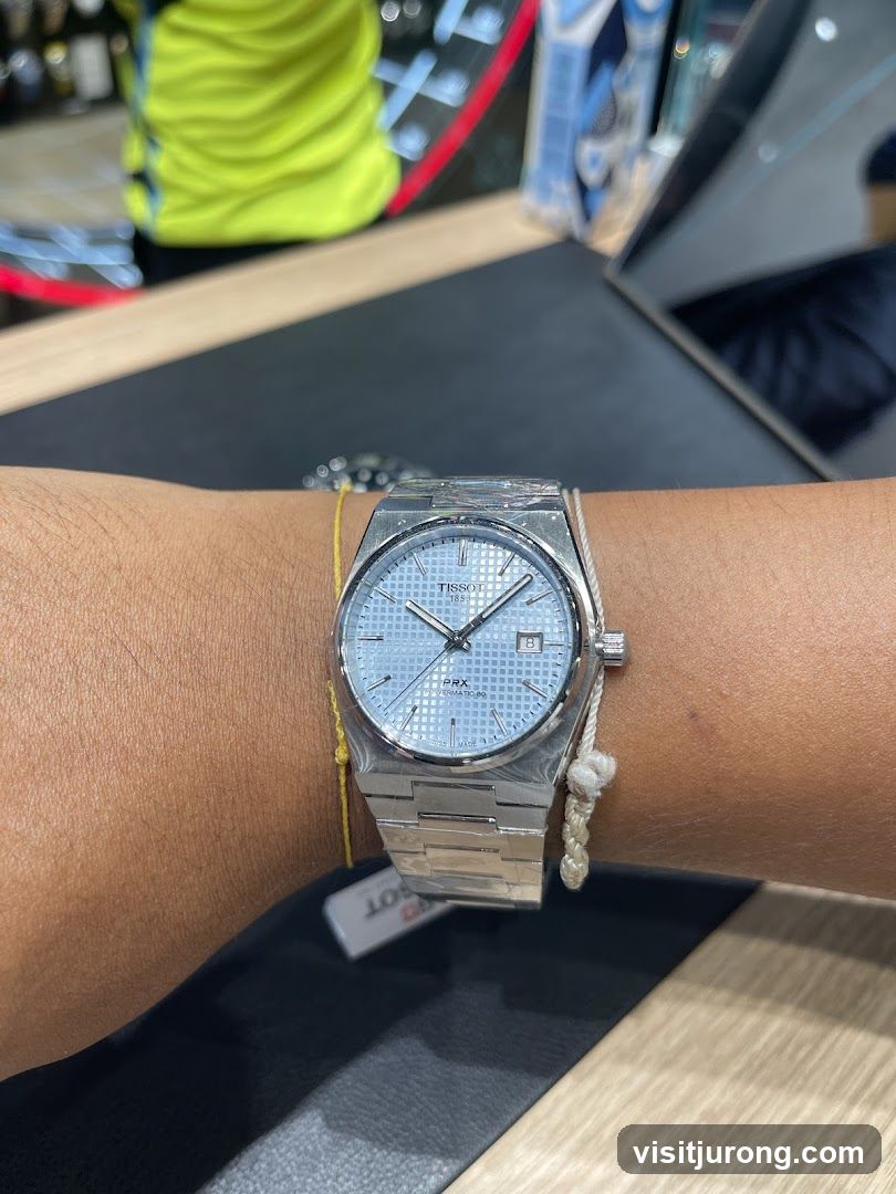 Tissot PRX watch on wrist