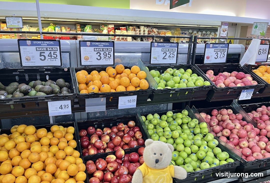 Produce aisle with sale signs