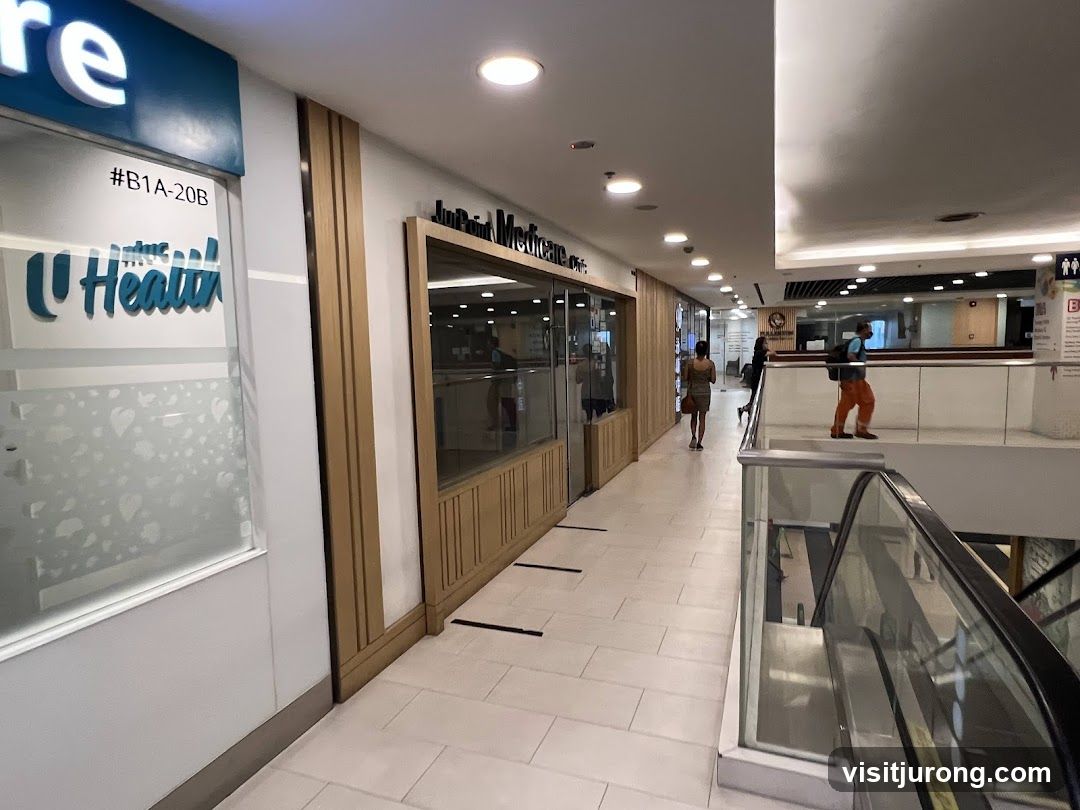Indoor Mall Corridor with Shops and Escalator