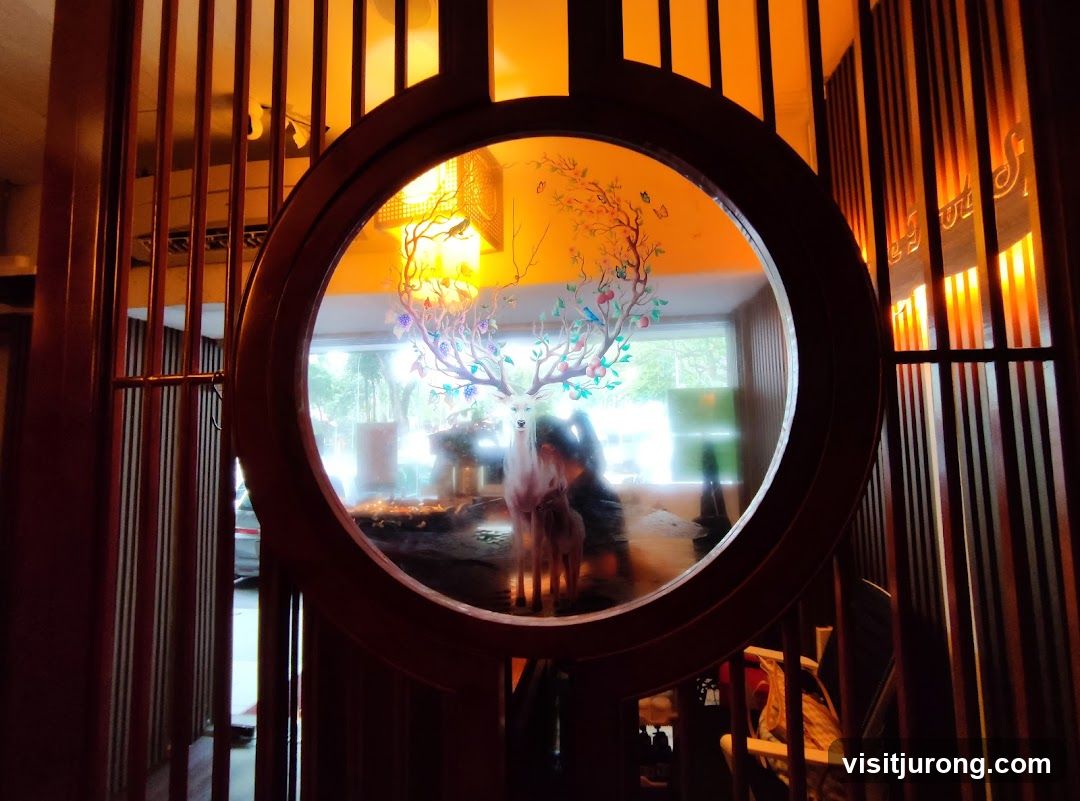 Decorative Window with Deer and Tree Motif