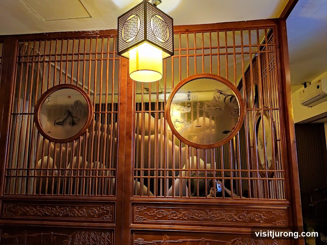 Decorative wooden screen with circular paintings