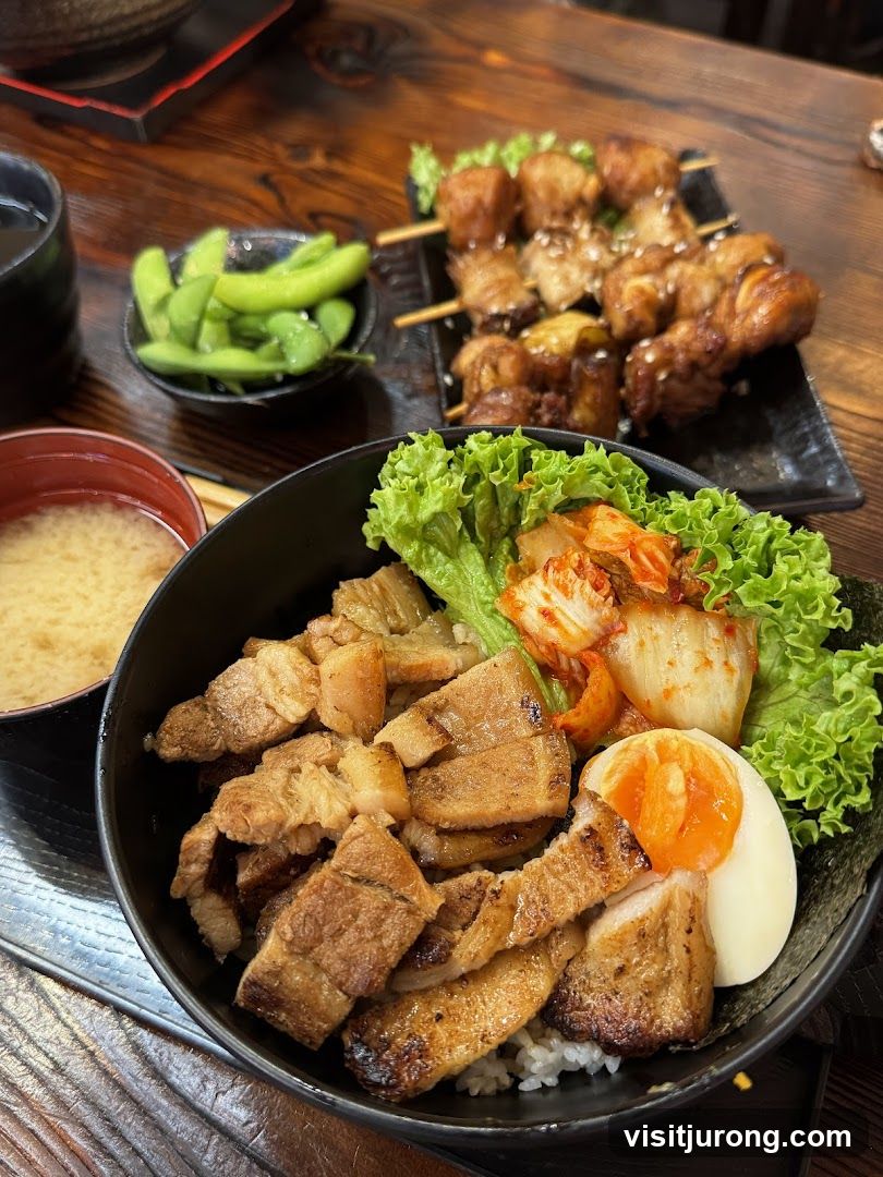 Pork Belly Rice Bowl with Edamame and Skewers
