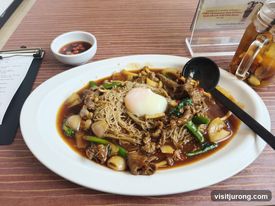 Beef and Noodle Dish with Poached Egg