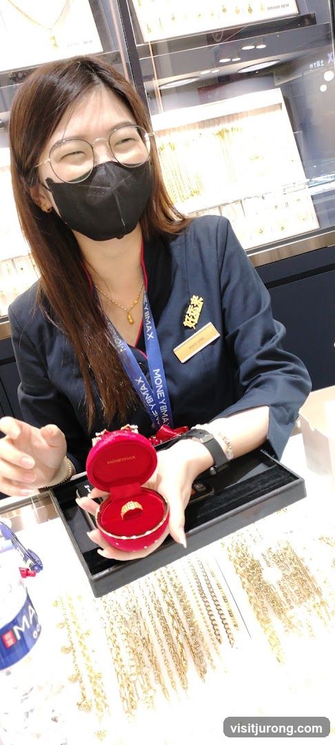 Jewelry Store Employee Showing a Ring