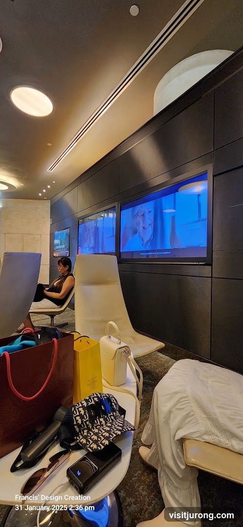 Waiting Area with Screens and Bags