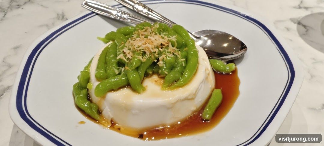 Dessert with Green Noodles and Coconut Flakes