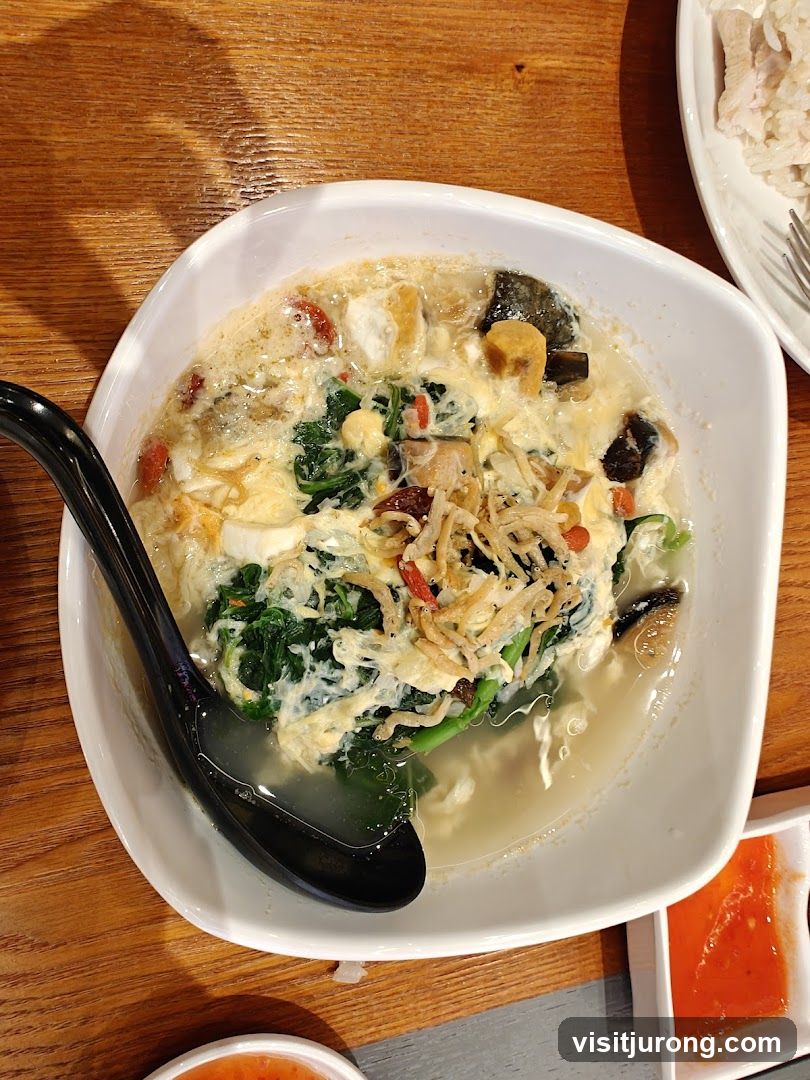 Bowl of Soup with Vegetables and Egg