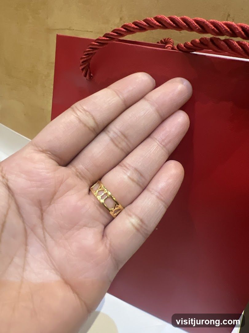 Hand with Ring and Gift Bag