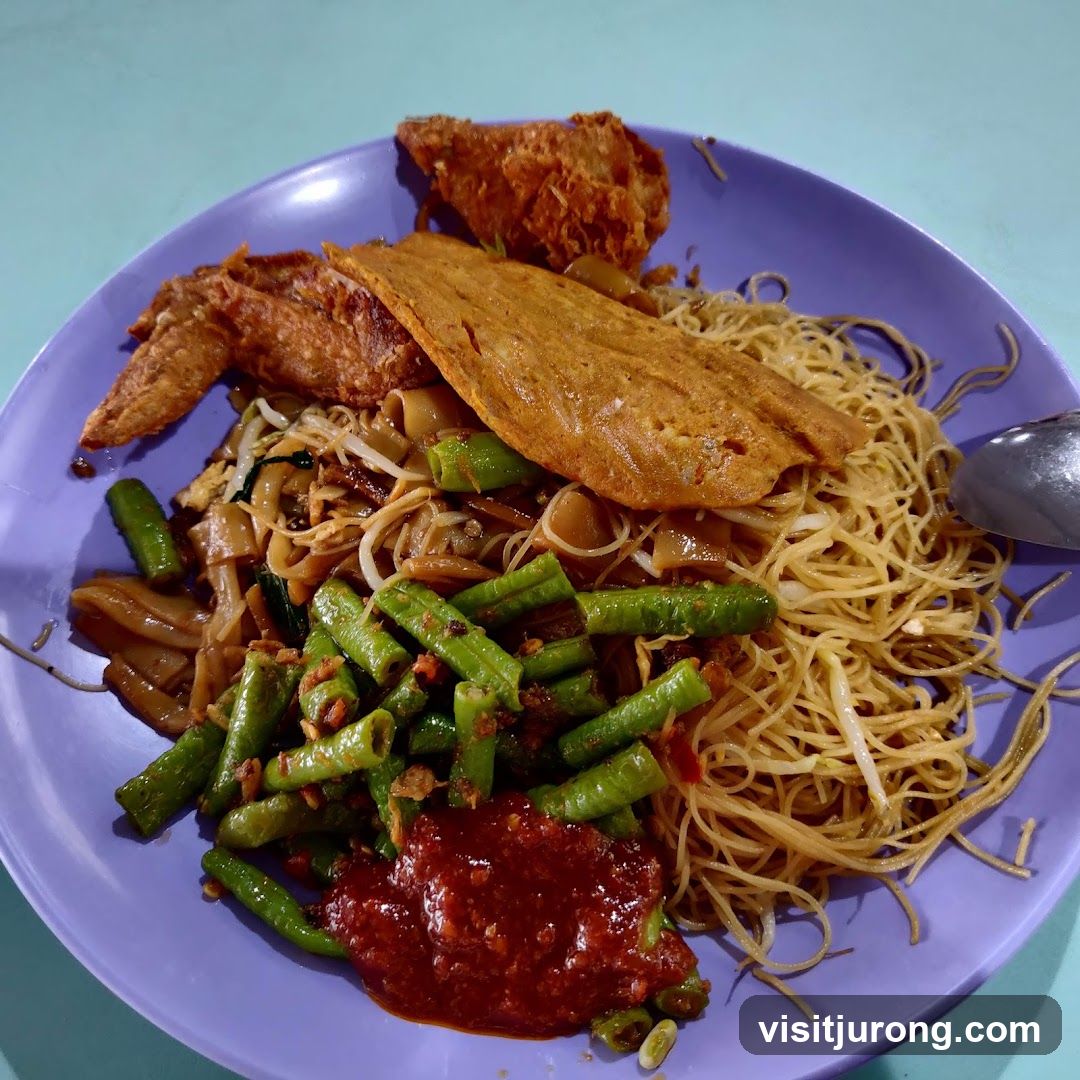 Plate of Noodles with Fried Chicken and Vegetables