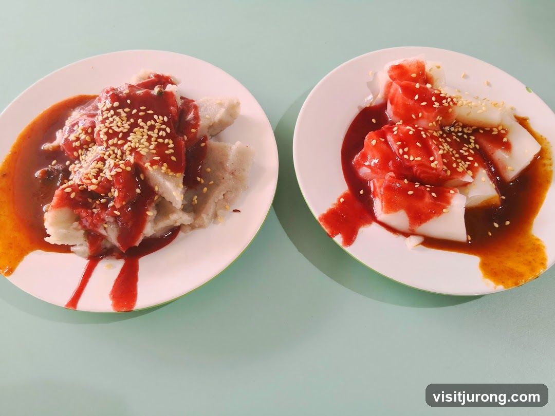 Two plates of rice noodle rolls with sauce and sesame seeds