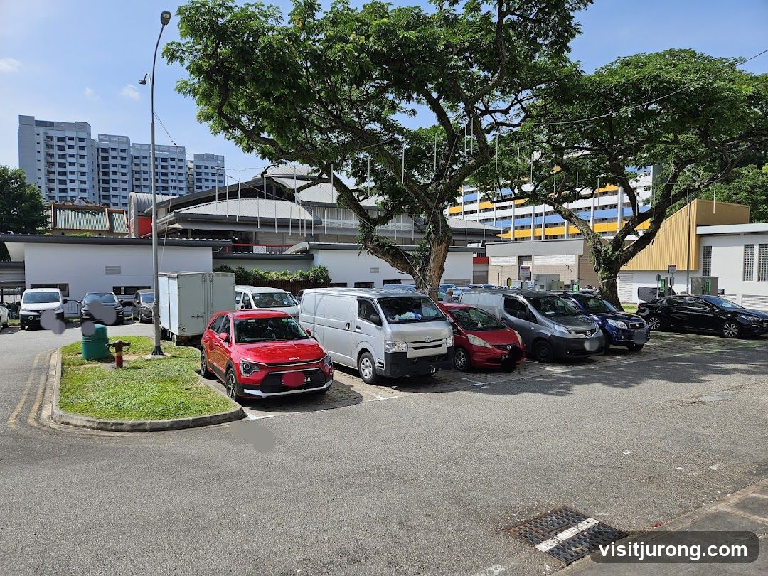 Parking Lot with Vehicles and Buildings
