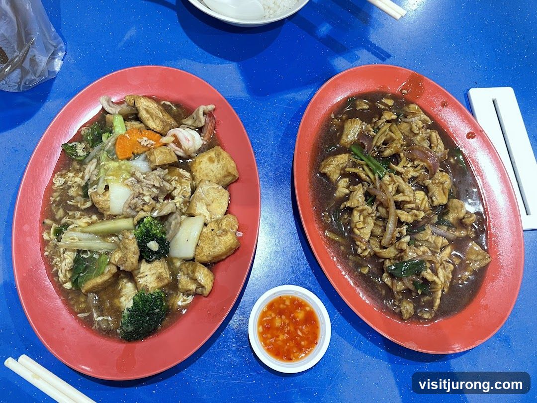 Two plates of food on a blue table