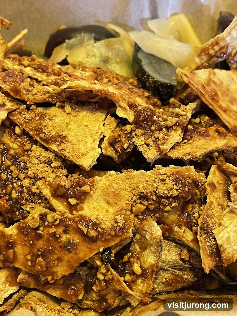 Crispy Fried Fish with Nuts and Sauce