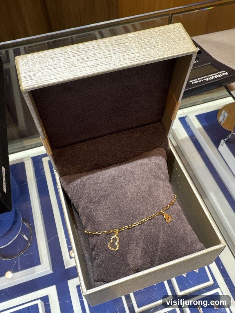 Gold bracelet with charms in a gift box