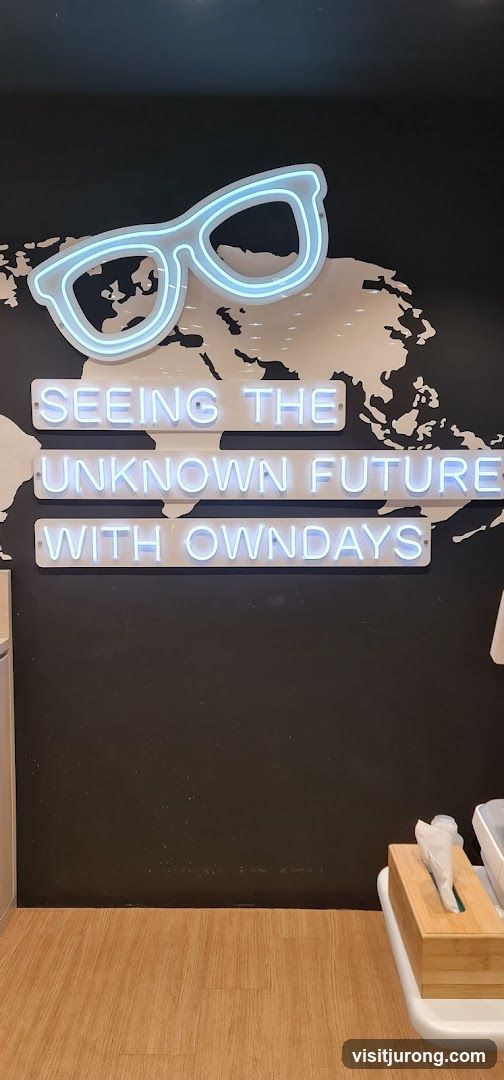 Neon glasses and text on wall