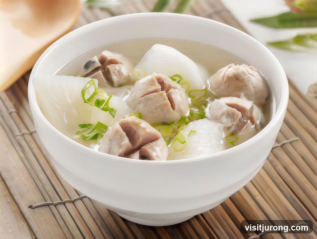 Bowl of Soup with Meatballs and Radish