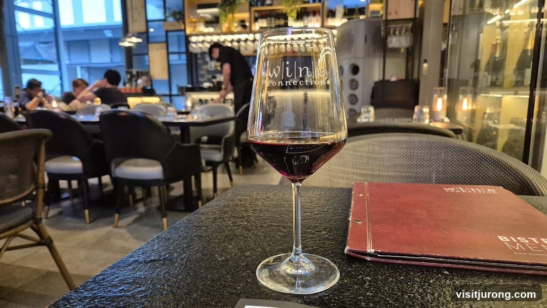 Wine Glass and Menu at a Restaurant
