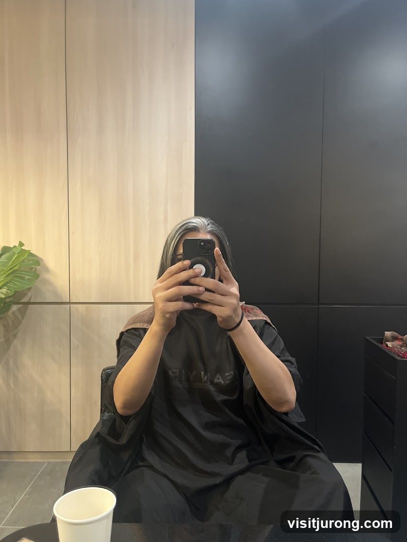 Person in Salon Cape