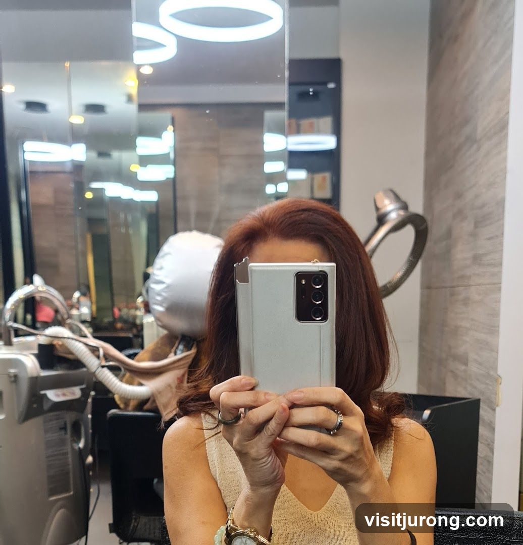 Woman taking a selfie in a salon